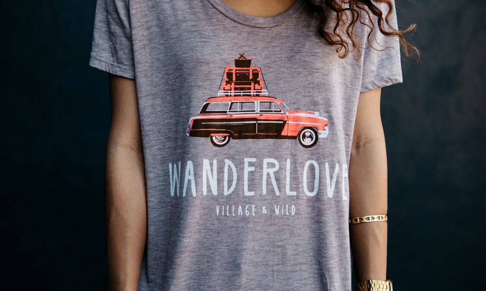 A customer wears a custom t-shirt as a gift