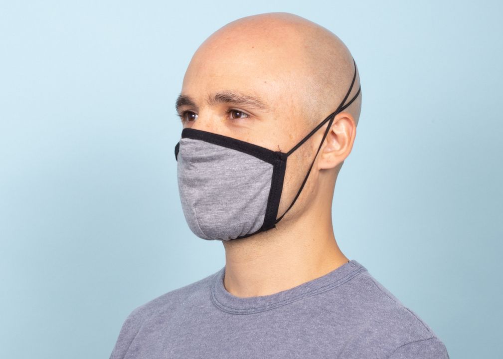 bald man wearing face mask 