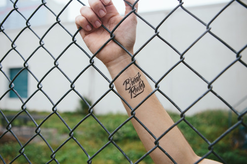 hand on fence