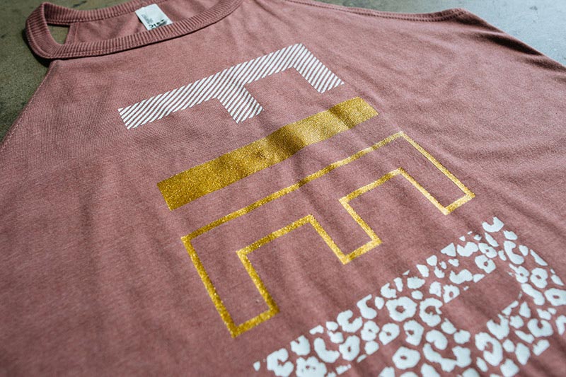 pink shirt with gold foil printing