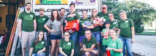 group shot of people wearing the same green shirt
