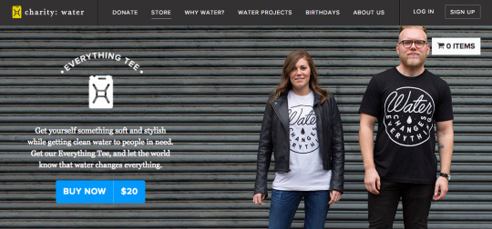 two people modeling Charity Water t-shirt