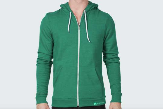 man wearing green zip up jacket