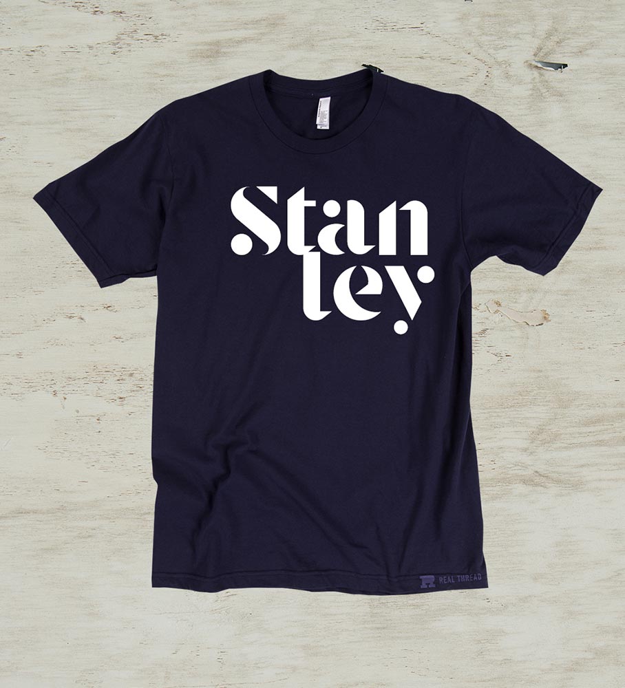 black shirt with white text on front