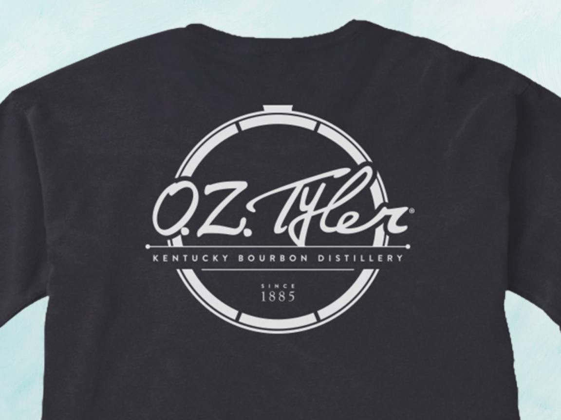 Black sweatshirt with white circle outline logo and O.Z. Tyler spelled out