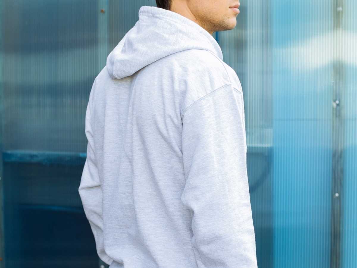 The back of a gray hoodie. 