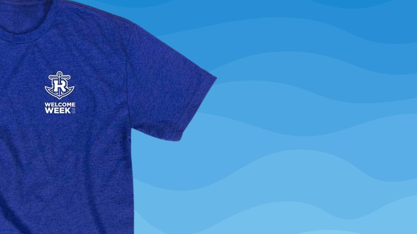 Royal blue shirt with a white anchor and R logo on a wave background