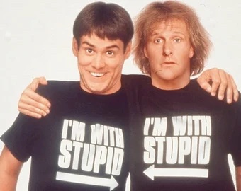 Dumb and Dumber guys wear shirts that say "I'm with Stupid" with arrows pointing at each other.